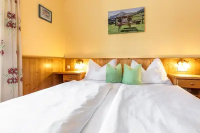 Ein Bett oder Betten in einem Zimmer der Unterkunft Pension Antonia