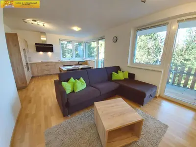 Ein Sitzbereich in der Unterkunft Apartment Alpenoase