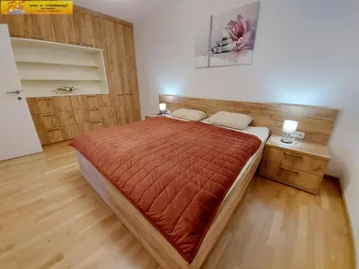 Ein Bett oder Betten in einem Zimmer der Unterkunft Apartment Alpenoase