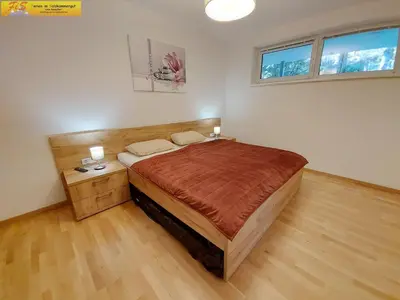 Ein Bett oder Betten in einem Zimmer der Unterkunft Apartment Alpenoase