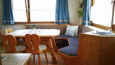Ein Sitzbereich in der Unterkunft Ferienhaus Heiderand