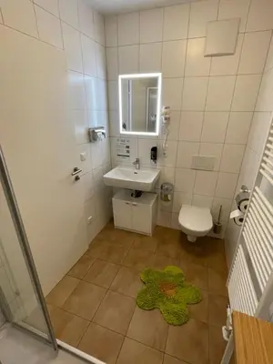 Ein Badezimmer in der Unterkunft Pension Göschlberger
