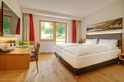Ein Bett oder Betten in einem Zimmer der Unterkunft Hotel Schütterhof