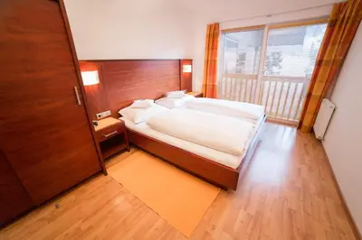 Ein Bett oder Betten in einem Zimmer der Unterkunft WOHNEN by LIZZY