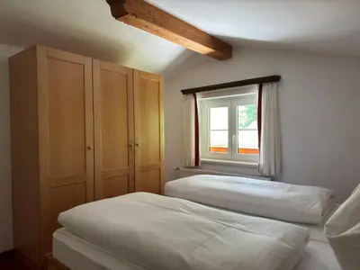 Ein Bett oder Betten in einem Zimmer der Unterkunft Das Anja Alt Filzmoos