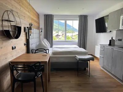 Ein Bett oder Betten in einem Zimmer der Unterkunft Das Anja Alt Filzmoos