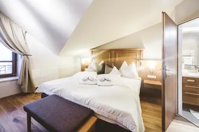 Ein Bett oder Betten in einem Zimmer der Unterkunft Familien- und Wellnesshotel Hanneshof