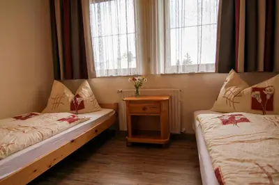Ein Bett oder Betten in einem Zimmer der Unterkunft Landhaus Kogler