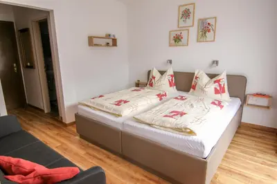 Ein Bett oder Betten in einem Zimmer der Unterkunft Landhaus Kogler