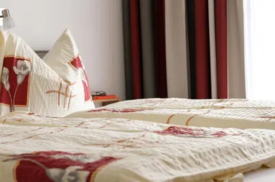 Ein Bett oder Betten in einem Zimmer der Unterkunft Landhaus Kogler