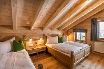Ein Bett oder Betten in einem Zimmer der Unterkunft Prenner Alm
