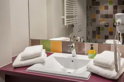 Ein Badezimmer in der Unterkunft Explorer Hotel Hinterstoder