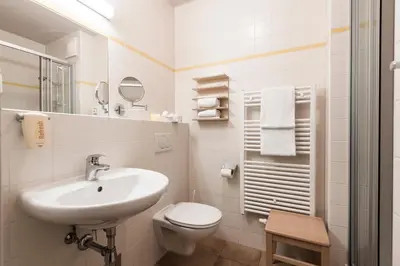 Ein Badezimmer in der Unterkunft JUFA Hotel Grundlsee