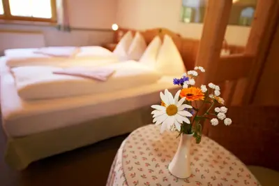 Ein Bett oder Betten in einem Zimmer der Unterkunft Blasiwirt