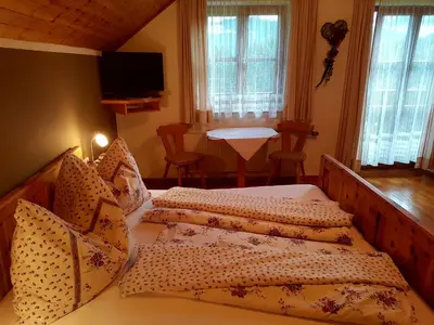 Ein Bett oder Betten in einem Zimmer der Unterkunft Biohof Poinsitgut