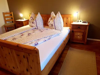 Ein Bett oder Betten in einem Zimmer der Unterkunft Biohof Poinsitgut