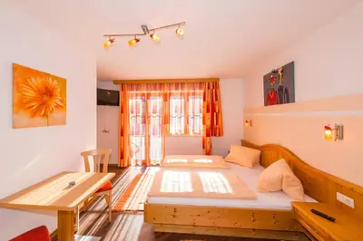 Ein Bett oder Betten in einem Zimmer der Unterkunft Maria's Sonnenquartier