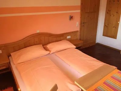 Ein Bett oder Betten in einem Zimmer der Unterkunft Maria's Sonnenquartier