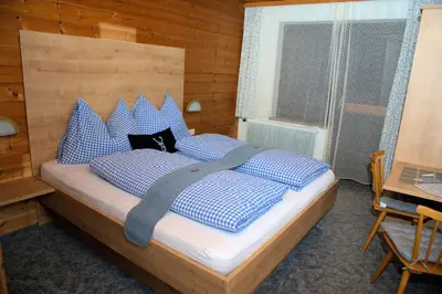 Ein Bett oder Betten in einem Zimmer der Unterkunft Pension Mitterwallner