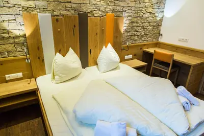 Ein Bett oder Betten in einem Zimmer der Unterkunft Appartement Alpenfex