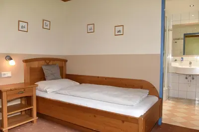Ein Bett oder Betten in einem Zimmer der Unterkunft Frühstückspension Oberweissburg