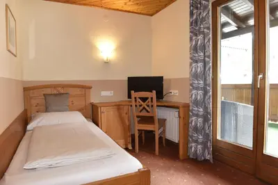 Ein Bett oder Betten in einem Zimmer der Unterkunft Frühstückspension Oberweissburg