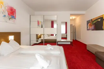 Ein Bett oder Betten in einem Zimmer der Unterkunft Appartementhaus Modern Art by Schladming-Appartements
