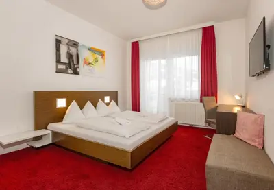 Ein Bett oder Betten in einem Zimmer der Unterkunft Appartementhaus Modern Art by Schladming-Appartements