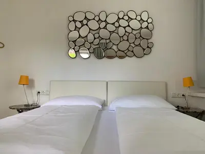 Ein Bett oder Betten in einem Zimmer der Unterkunft Boutique Hotel Oase