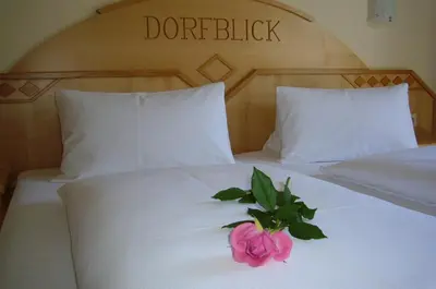 Ein Bett oder Betten in einem Zimmer der Unterkunft Haus Dorfblick