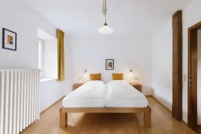 Ein Bett oder Betten in einem Zimmer der Unterkunft Sonnhof