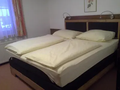 Ein Bett oder Betten in einem Zimmer der Unterkunft Appartements Landhaus Monika Jäger