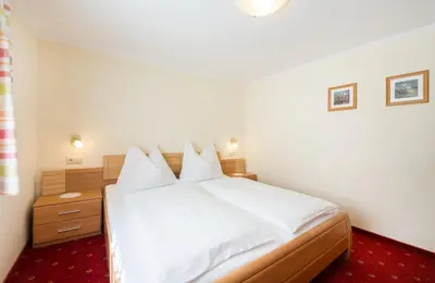 Ein Bett oder Betten in einem Zimmer der Unterkunft 4 Mountains Apartments