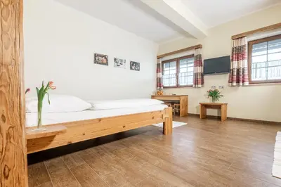 Ein Bett oder Betten in einem Zimmer der Unterkunft Pension Feichthub