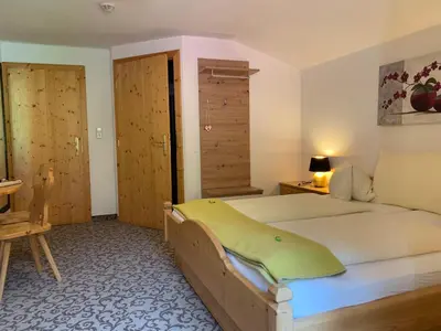 Ein Bett oder Betten in einem Zimmer der Unterkunft Heisshof