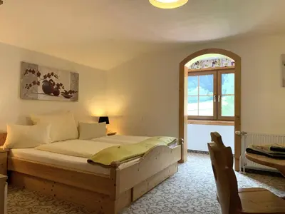 Ein Bett oder Betten in einem Zimmer der Unterkunft Heisshof