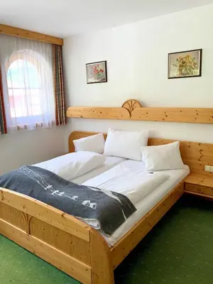 Ein Bett oder Betten in einem Zimmer der Unterkunft Heisshof