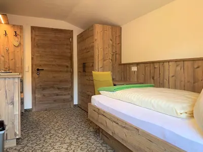 Ein Bett oder Betten in einem Zimmer der Unterkunft Heisshof