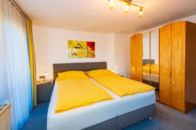 Ein Bett oder Betten in einem Zimmer der Unterkunft Ferienwohnung Franck
