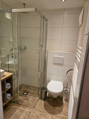 Ein Badezimmer in der Unterkunft Gasthof - Restaurant Löcker