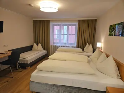 Ein Bett oder Betten in einem Zimmer der Unterkunft Gasthof - Restaurant Löcker