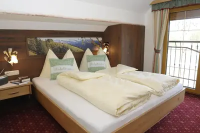 Ein Bett oder Betten in einem Zimmer der Unterkunft Bio-Bauernhof Samerhof