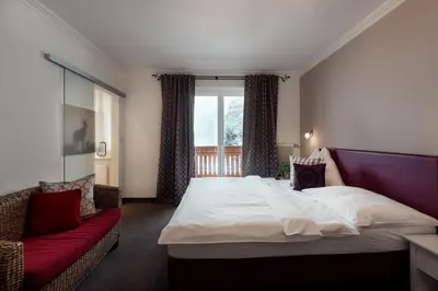 Ein Bett oder Betten in einem Zimmer der Unterkunft Der Jagdhof