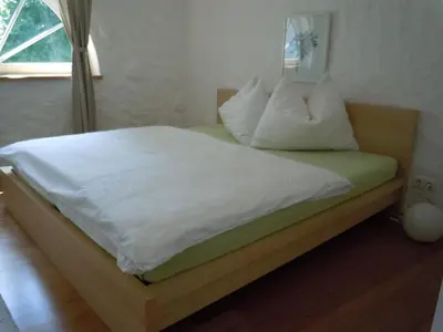 Ein Bett oder Betten in einem Zimmer der Unterkunft Appartementhaus Dargham