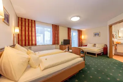 Ein Bett oder Betten in einem Zimmer der Unterkunft Pension Elisabeth