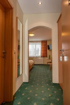 Ein Bett oder Betten in einem Zimmer der Unterkunft Pension Elisabeth