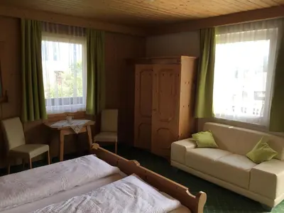Ein Bett oder Betten in einem Zimmer der Unterkunft Gästehaus Lemmerer