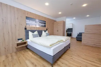 Ein Bett oder Betten in einem Zimmer der Unterkunft Hotel Schönberger