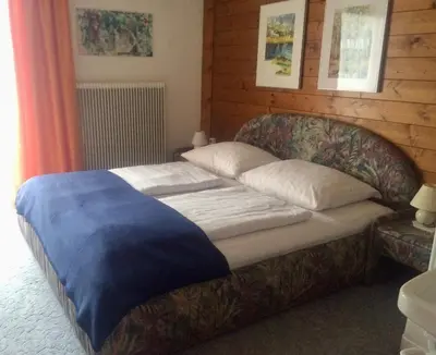 Ein Bett oder Betten in einem Zimmer der Unterkunft Ferienwohnung Salchegger