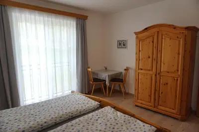 Ein Bett oder Betten in einem Zimmer der Unterkunft Ferienwohnung Hausleitner